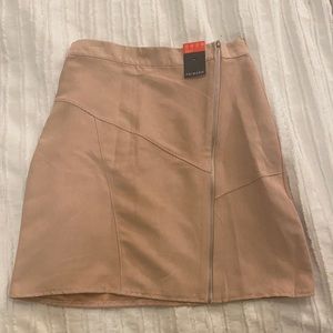 Asymmetrical zipper light pink suede mini skirt